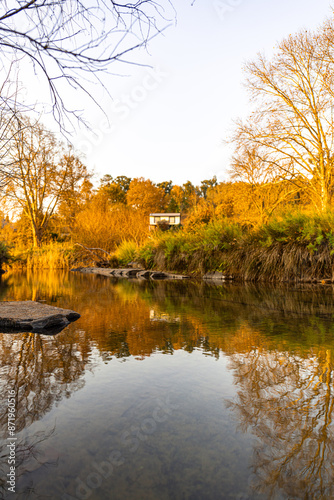 Sunrise along the river at the farm