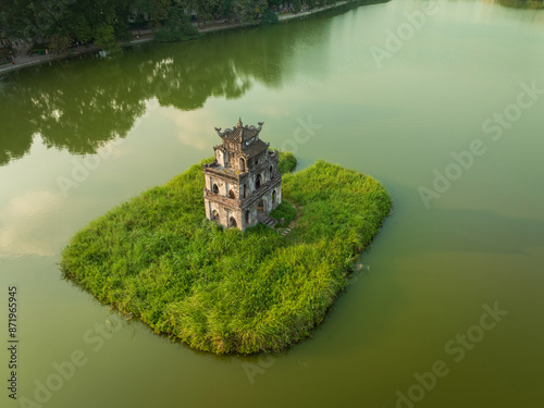 Fototapeta Naklejka Na Ścianę i Meble -  Drone closed view of Turtle tower in Hoan Kiem lake in Hanoi, Vietnam