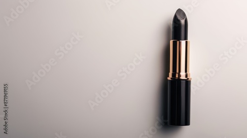 High-quality image of a black lipstick on a light background, ideal for beauty, fashion, and cosmetics-related content. photo