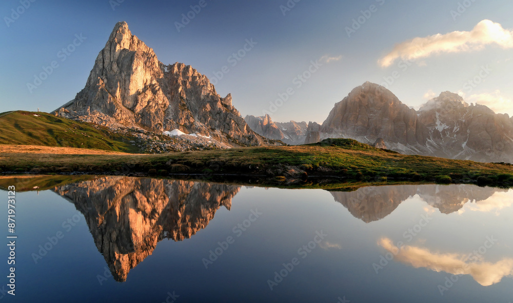 Mountains reflection in a lake in the Italian Dolomites