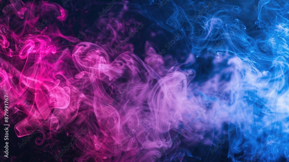 Obraz premium Close-up of colorful pink and blue smoke blending artistically on a black surface, ideal for backgrounds or artistic concepts