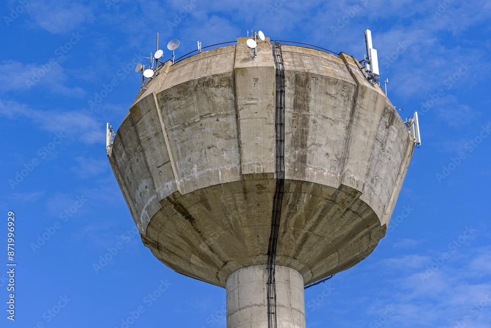Tall Concrete Tower Water Supply for Village With Cell Phone Gsm Antennas Tall Concrete Tower Water Supply for Village With Cell Phone Gsm Antennas