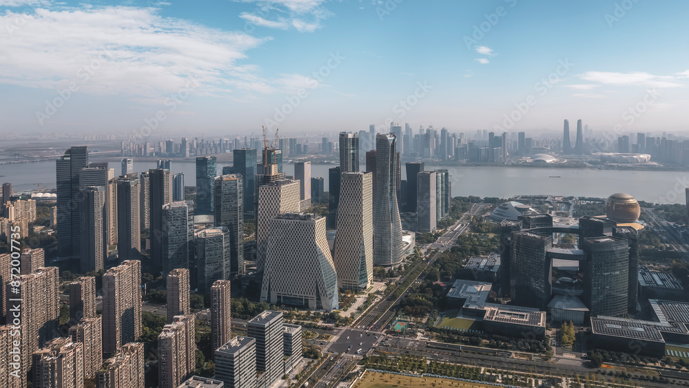 Fototapeta premium Modern City Skyline with Futuristic Buildings and River