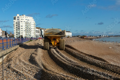 sanding the beach