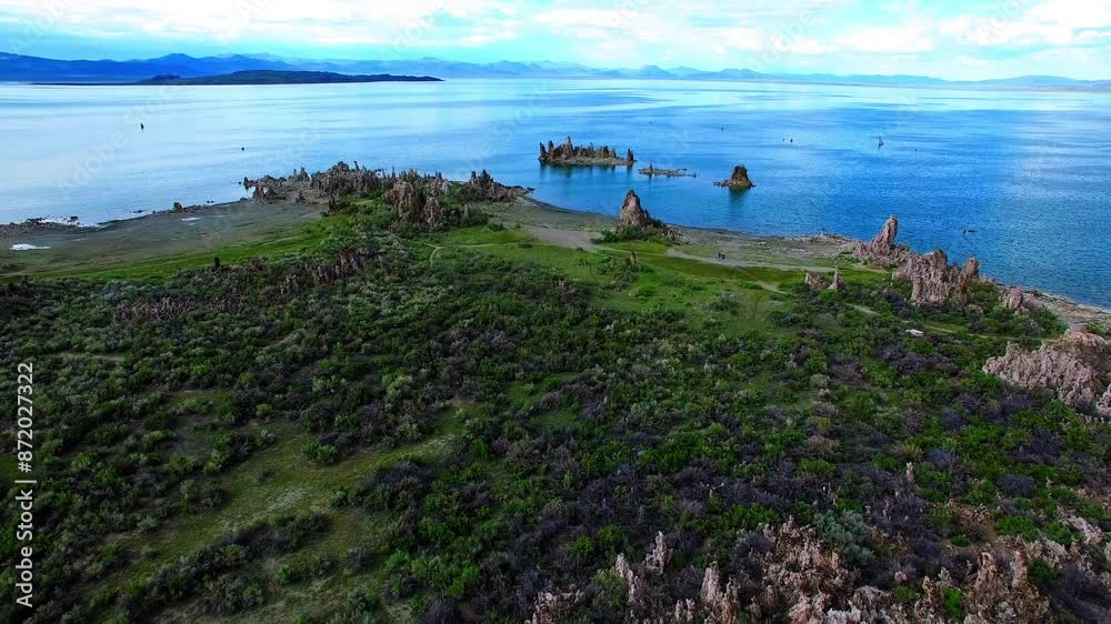 Aerial Beautiful Shot Soda Saline Lake By Mountains, Drone Flying Downwards Over Eroded Landscape - Lee Vining, California Aerial Beautiful Shot Soda Saline Lake By Mountains, Drone Flying Downwards Over Eroded Landscape - Lee Vining, California