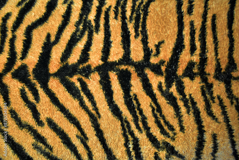 Tiger skin texture, tiger stripes background Tiger skin texture, tiger stripes background