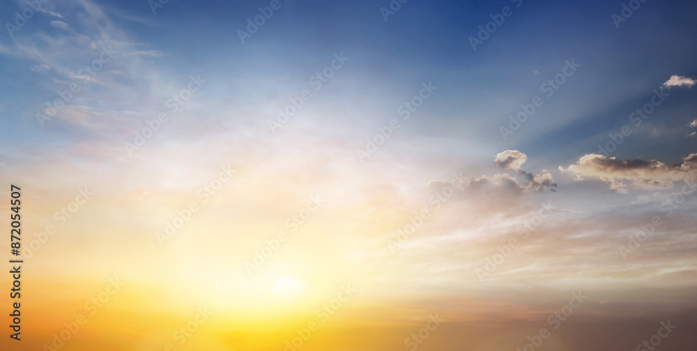 Fototapeta premium Sunset Sky Clouds in the Evening with colorful Orange, Yellow, Pink and red sunlight and Dramatic storm clouds on Twilight sky