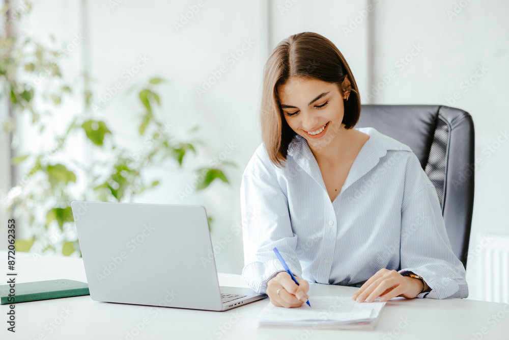 Young Professional Woman Working in Modern Office Young Professional Woman Working in Modern Office