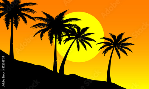 Silhouette of a coconut tree in the evening sunset