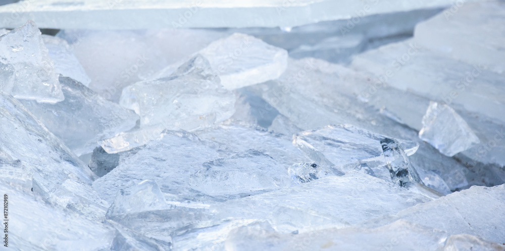 Frozen sea coast covered with broken ice, close up photo Frozen sea coast covered with broken ice, close up photo
