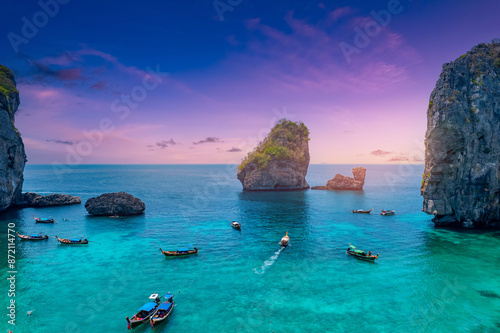 Aerial view paradise Nui beach, turquoise lagoon with white coral sand and palms on sunset time. Landscape koh Phi Phi Don island, Krabi, Thailand photo