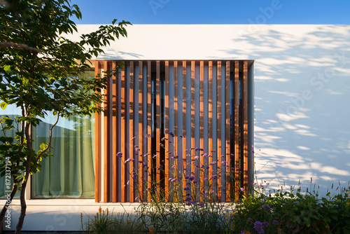 Modern Home with Pool, Designer Features, and Lush Greenery