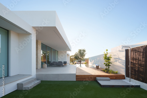 Modern Home with Pool, Designer Features, and Lush Greenery