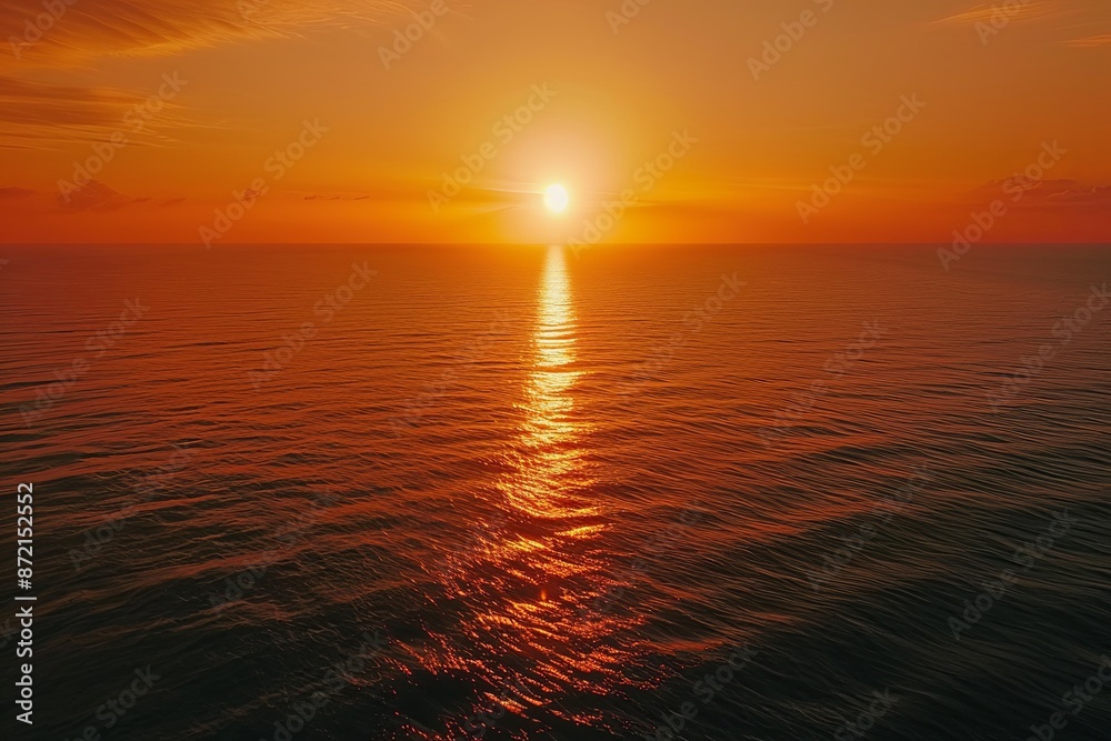 Obraz premium Ethereal Horizon: Sunset Over the Sea Painting the Sky in Shades of Orange