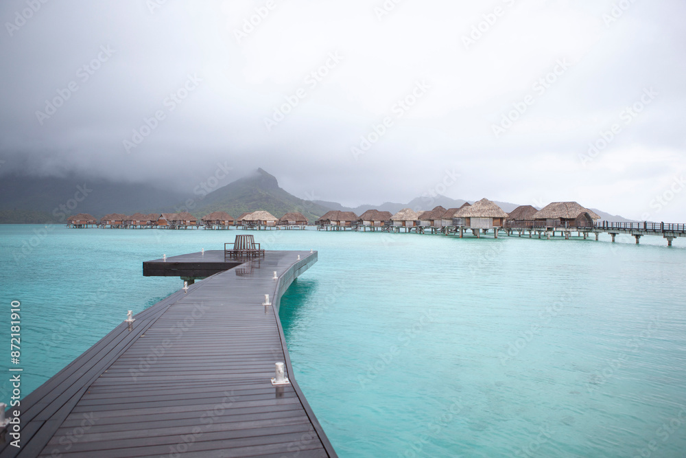 Wooden dock over turquoise water, Bora Bora lagoon, French Polynesia Wooden dock over turquoise water, Bora Bora lagoon, French Polynesia