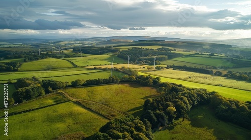 Aerial View of Wind Turbines in a Rolling Green Landscape