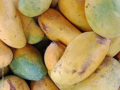 yellow mango fruit pile pattern.Mangifera indica fruit pile pattern  photo