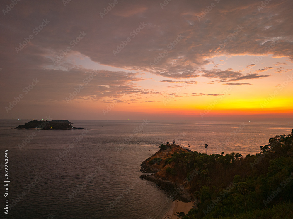 aerial view colorful cloud in stunning sunset above the sea at Laem Phrom Thep Viewpoint..Scene of clouds floating in colorful sky in beautiful sunset..Gradient color. abstract nature background.. aerial view colorful cloud in stunning sunset above the sea at Laem Phrom Thep Viewpoint..Scene of clouds floating in colorful sky in beautiful sunset..Gradient color. abstract nature background..