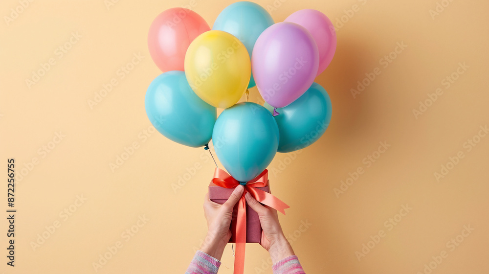gift with ballons hold from hands gift with ballons hold from hands