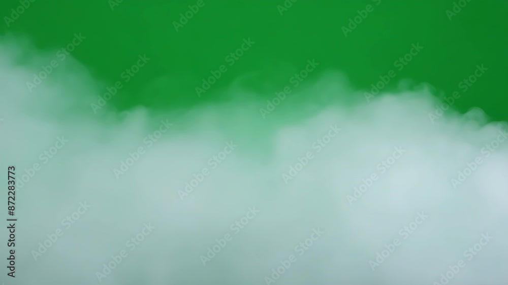 Fog or smoke rolling on green screen background