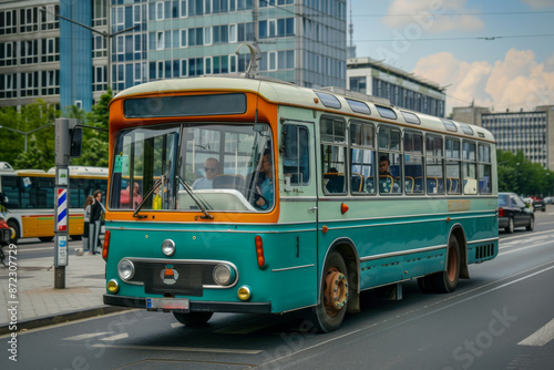 A vintage old passenger bus departing from a bus stop in the city center.