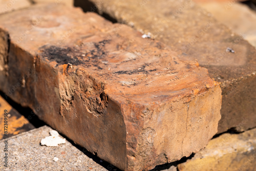 old used bricks made of red clay and other materials old used bricks made of red clay and other materials