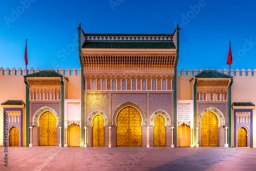 Fez, Morocco - March 23, 2024: Brass gate and zellige mosaic tilework on Dar al-Makhzen or Dar el-Makhzen royal palace in Fez, Morocco