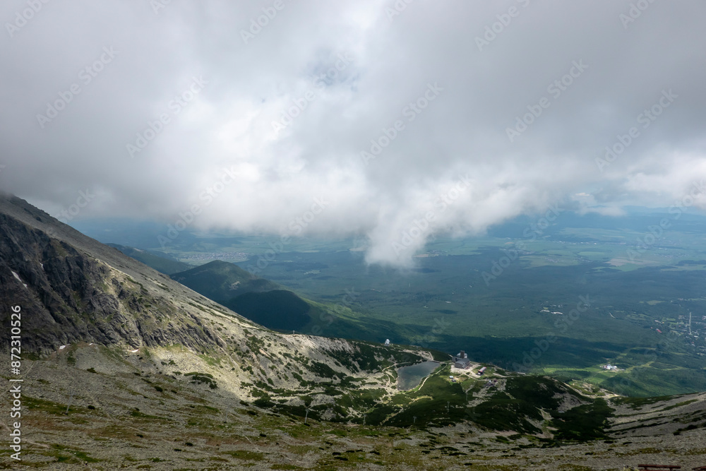 View of Skalnaté lake from the Lomnicke saddle in the High Tatras in Slovakia View of Skalnaté lake from the Lomnicke saddle in the High Tatras in Slovakia
