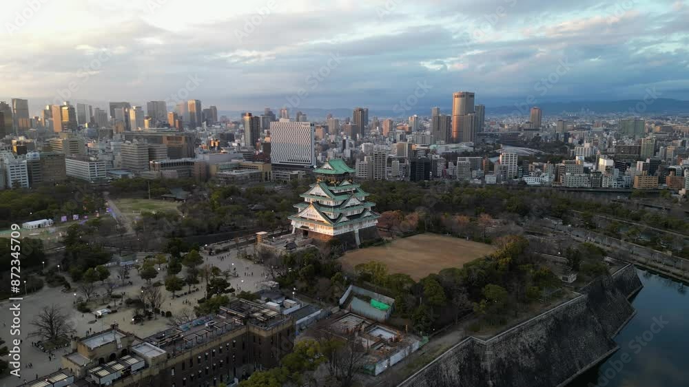 Aerial view of Osaka Castle flying over and revealing the Osaka skyline. Aerial view of Osaka Castle flying over and revealing the Osaka skyline.