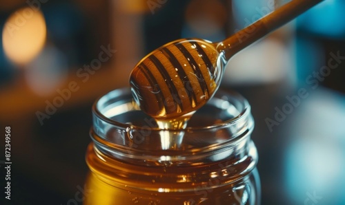 honey dripping from wooden spoon into glass jar, close-up, macro shot, commercial photography, cinematic style with professional color grading, shallow depth of field