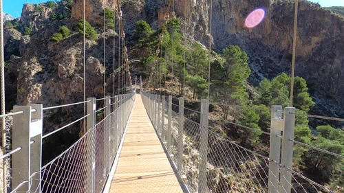 Hiking trail to Colgante bridge (Puente Colgante El Saltillo) over Almanchares river, Sierra Tejeda, Andalusia, Spain photo