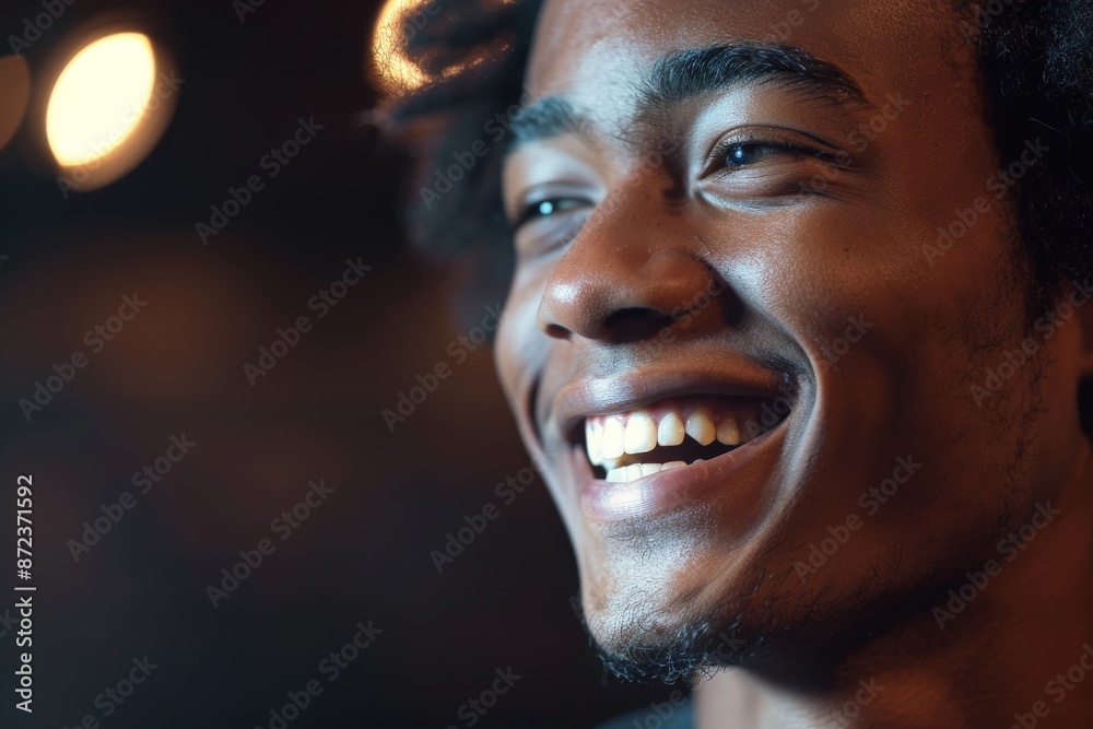 A person is seen in a dimly lit environment with a focused and intent look, suggesting deep thought or concentration, creating a mood of contemplation. A person is seen in a dimly lit environment with a focused and intent look, suggesting deep thought or concentration, creating a mood of contemplation.