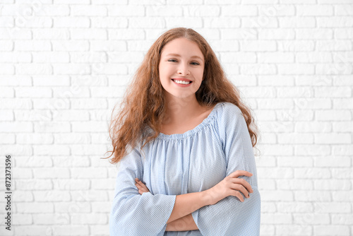 Portrait of happy redhead w...