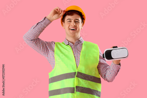 Male worker with VR glasses...