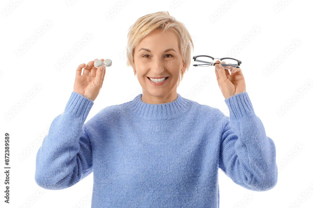 Obraz premium Mature woman with contact lens case and eyeglasses on white background