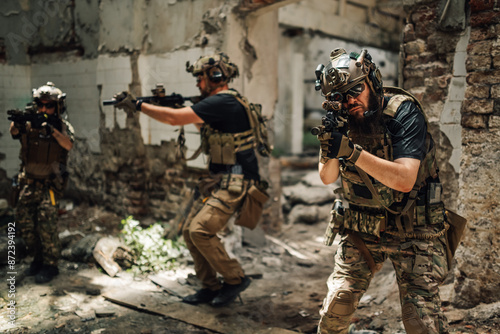 Front view of air soft player shooting with sniper rifle towards camera