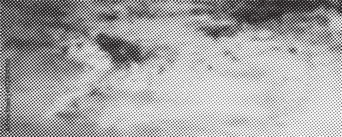 Grunge halftone gradient background. Faded grit noise texture. White and black sand wallpaper