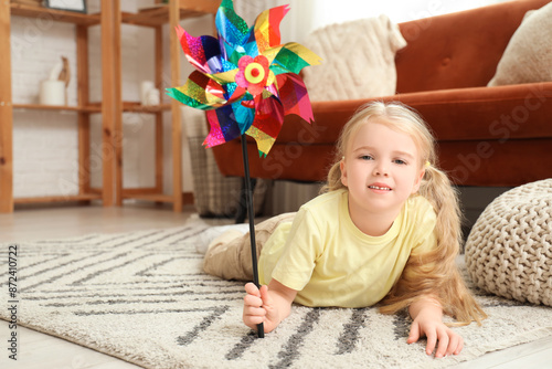 Cute little girl with toy w...