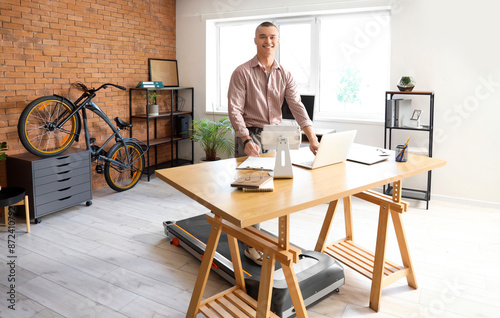 Young businessman working w...