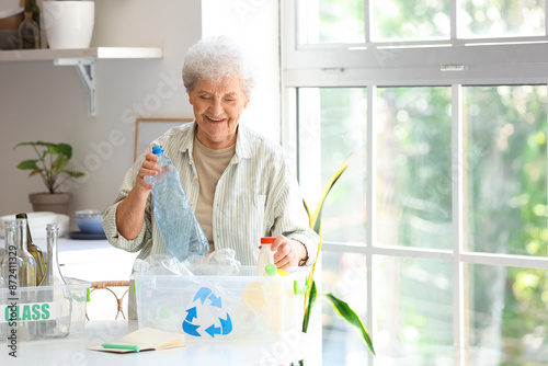 Senior woman with container...