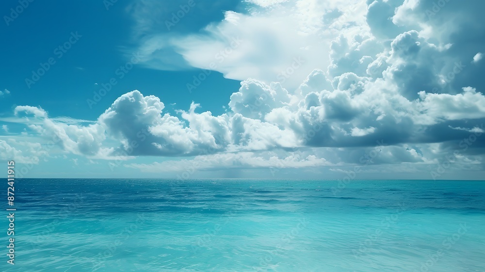 Fototapeta premium Blue Sky and Ocean with White Clouds.