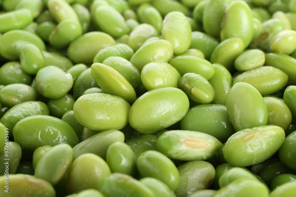 Raw green edamame soybeans as background, closeup Raw green edamame soybeans as background, closeup