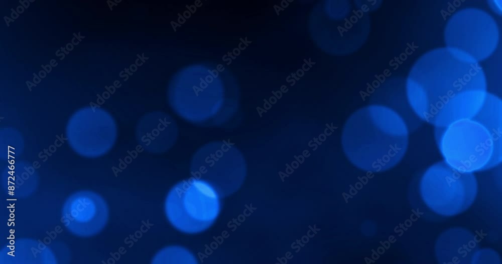Blue, bokeh and abstract or bubbles for backdrop, screensaver and wallpaper. Particles, glitter and spotlight by black background for aesthetic, glow and special effects for creativity or art Blue, bokeh and abstract or bubbles for backdrop, screensaver and wallpaper. Particles, glitter and spotlight by black background for aesthetic, glow and special effects for creativity or art