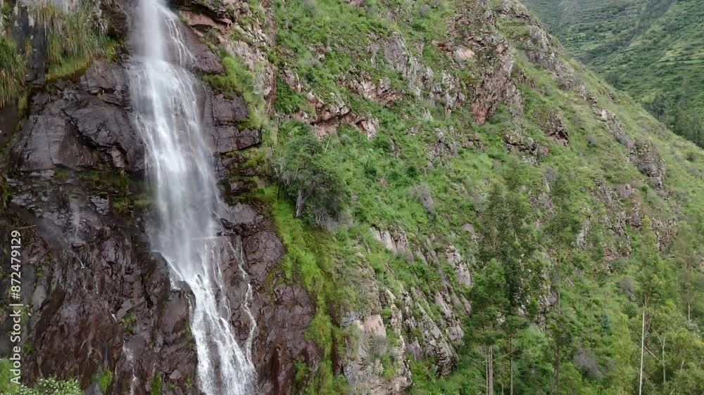The Catarata Perolniyoc In The Sacred Valley Of Cusco, Peru. Aerial Drone Shot The Catarata Perolniyoc In The Sacred Valley Of Cusco, Peru. Aerial Drone Shot