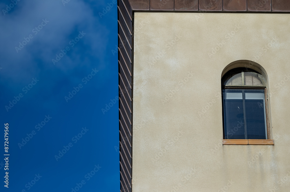 Building Corner with an Arched Window. Building Corner with an Arched Window.