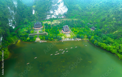 Landscape of Vu Cung at Tam Coc National Park. It was the place where the Tran Dynasty's struggle against the Nguyen Mong army took place and was also the practice place for feudal kings in Vietnam. photo