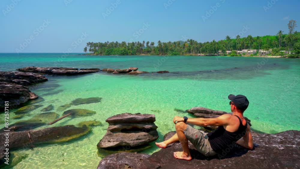 Tropical beach with crystal clear ocean, palm and silhouette travel people on beautiful nature background 4K Tropical beach with crystal clear ocean, palm and silhouette travel people on beautiful nature background 4K