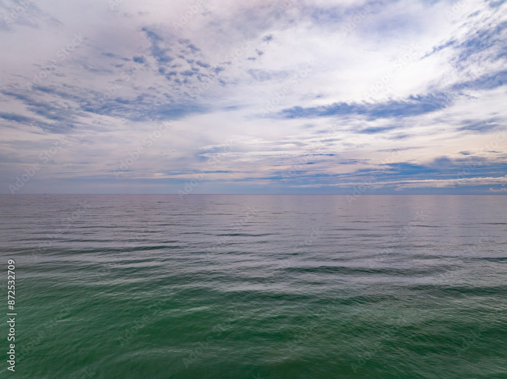 Fototapeta premium Aerial view of amazing sea surface water texture background,Beautiful sky clouds background