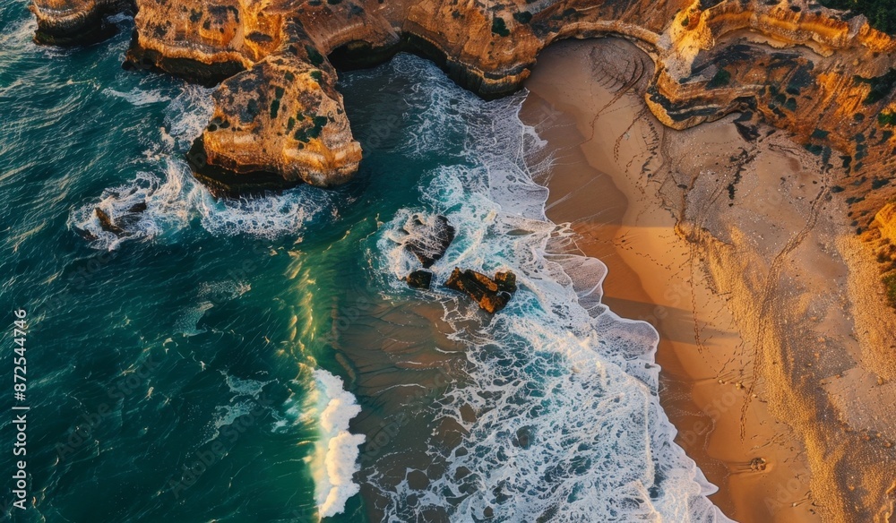 Breathtaking aerial view of a sandy beach with cliffs alongside it, tourist spot, scenic view, sunset Breathtaking aerial view of a sandy beach with cliffs alongside it, tourist spot, scenic view, sunset