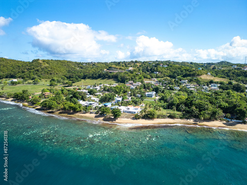 Aerial coastline view of the beautiful oceanfront town of Rincon, Puerto Rico in the Caribbean